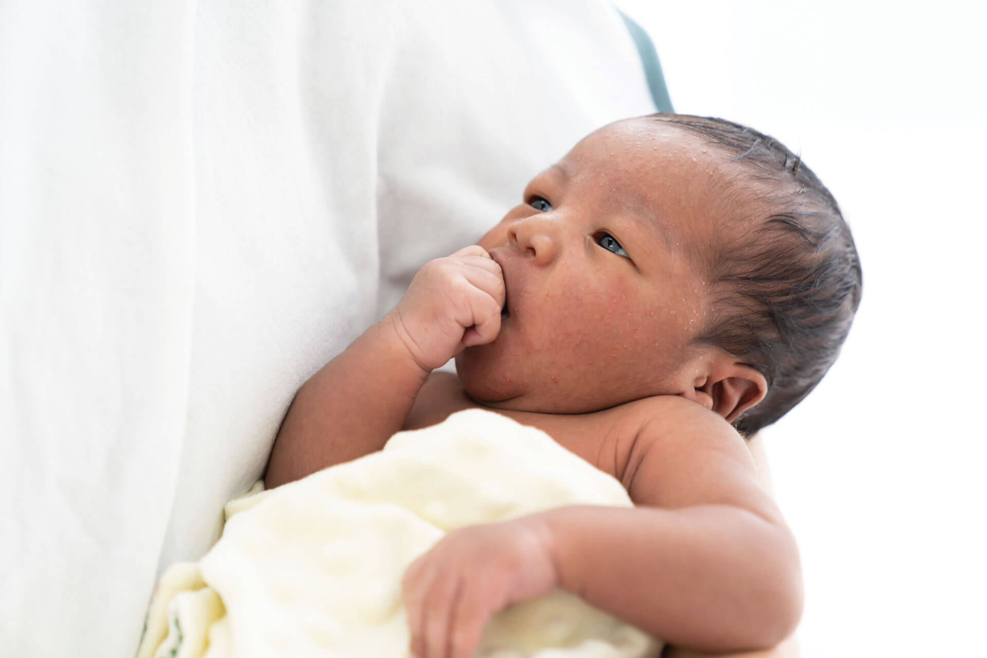 Newborn baby sucking