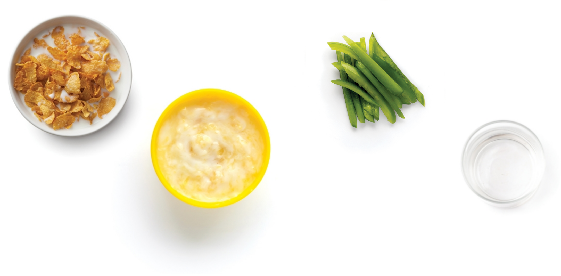 A bowl of green beans, a bowl of mashed potatoes, and a bowl of corn