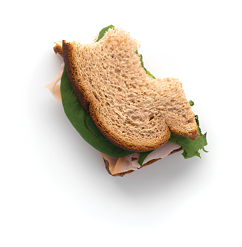 Bread topped with fresh vegetables