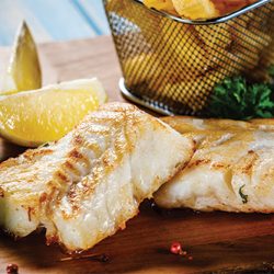 Grilled fish fillet on a plate